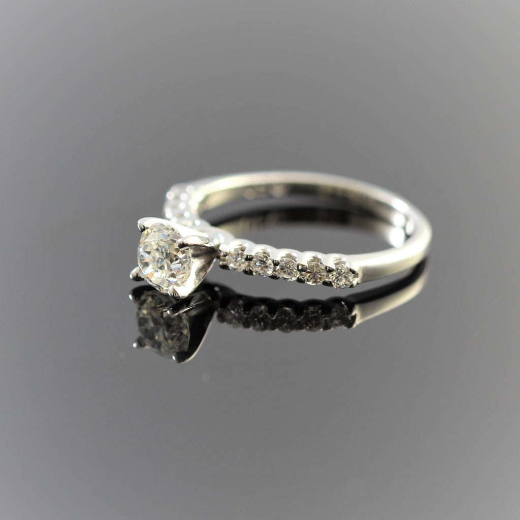 14k White Gold Round Diamond (.64ct) With Side Round Diamonds (.25) On Shank Engagement Ring