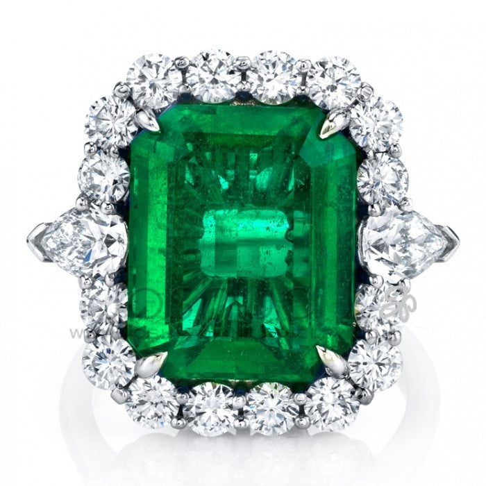 Emerald (8.59ct) With Oval Diamond (1.41) Side Stones & Diamond (.88ct) Halo Platinum Ring